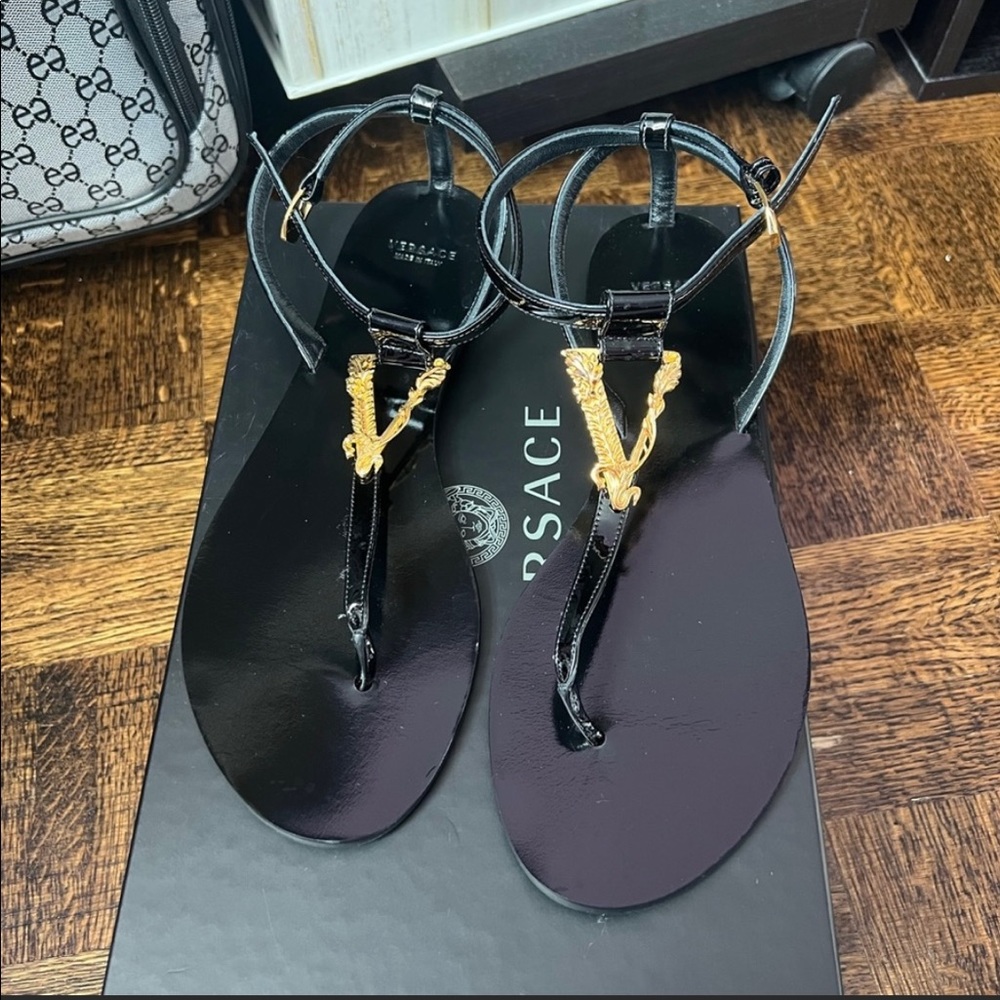 Like new Versace sandals .